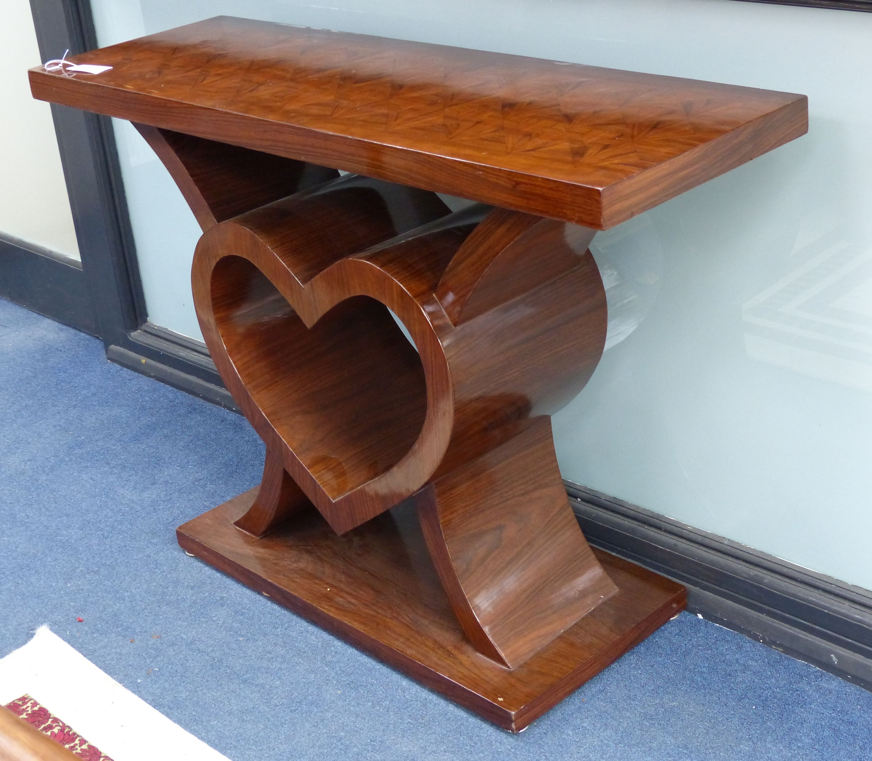 An Art Deco style walnut console table, width 120cm, depth 40cm, height 84cm